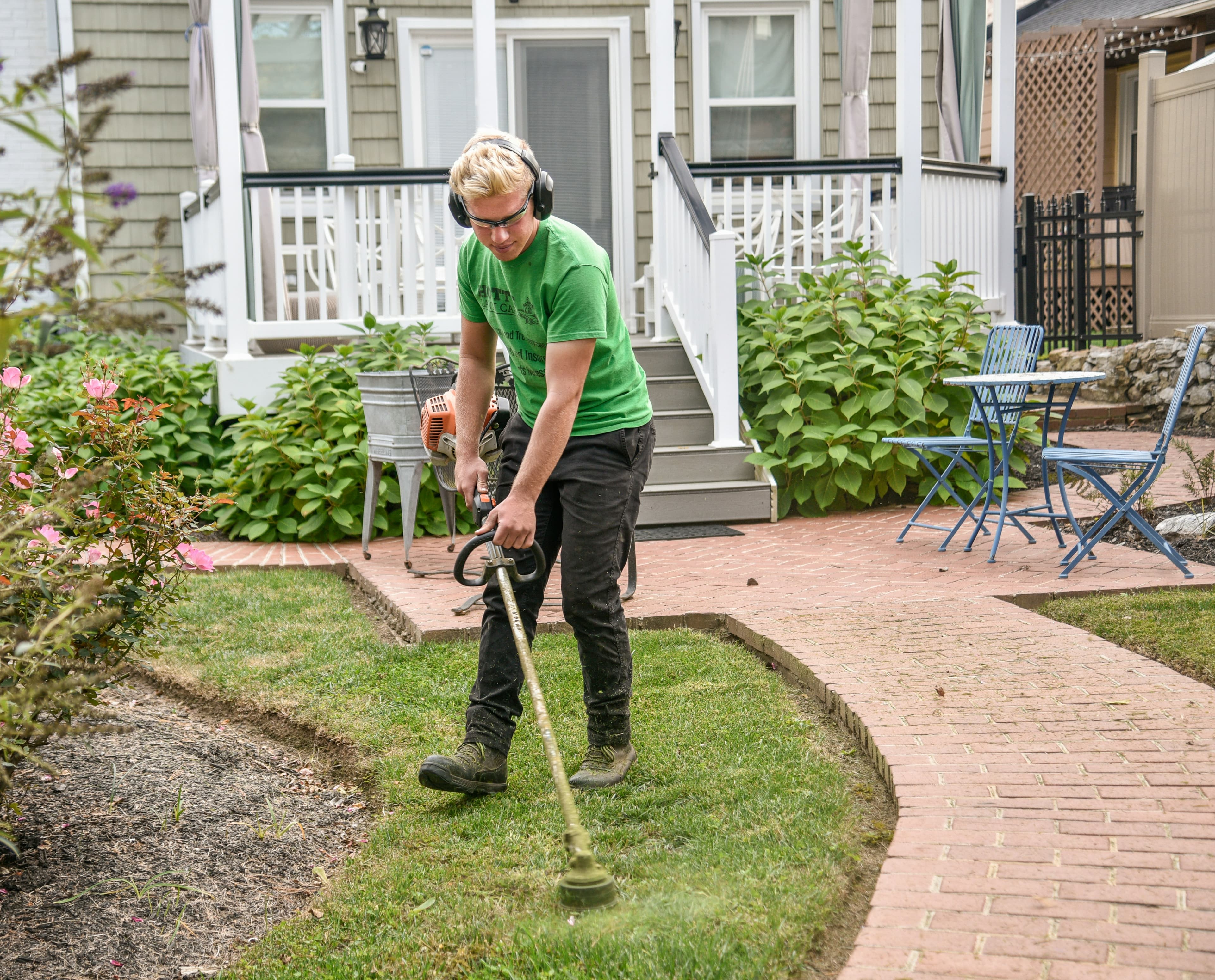 All-electric landscaping equipment at work